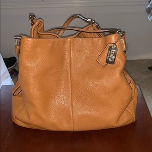 Tan Coach purse